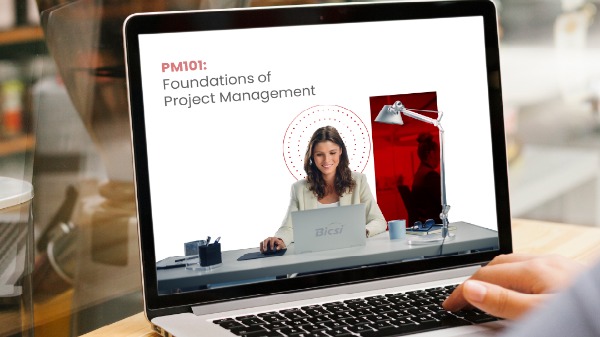 laptop with the image of a woman manager working at her desk