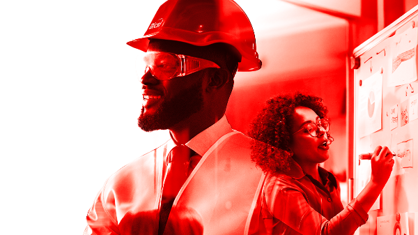 man with hard hat and a woman in a meeting in double exposure and red colored tint effect
